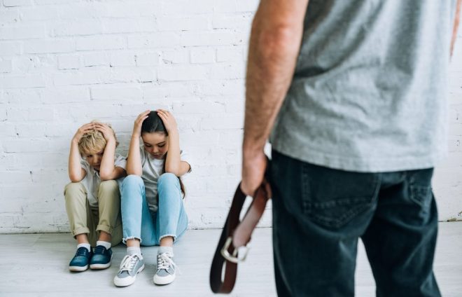 cropped-view-of-abusive-father-holding-belt-and-sc-2023-11-27-05-14-05-utc