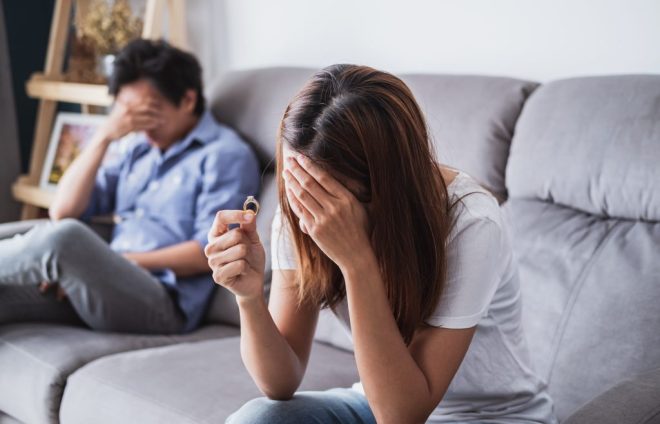 frustrated-sad-wife-taking-off-the-wedding-ring-y-2023-11-27-04-51-48-utc